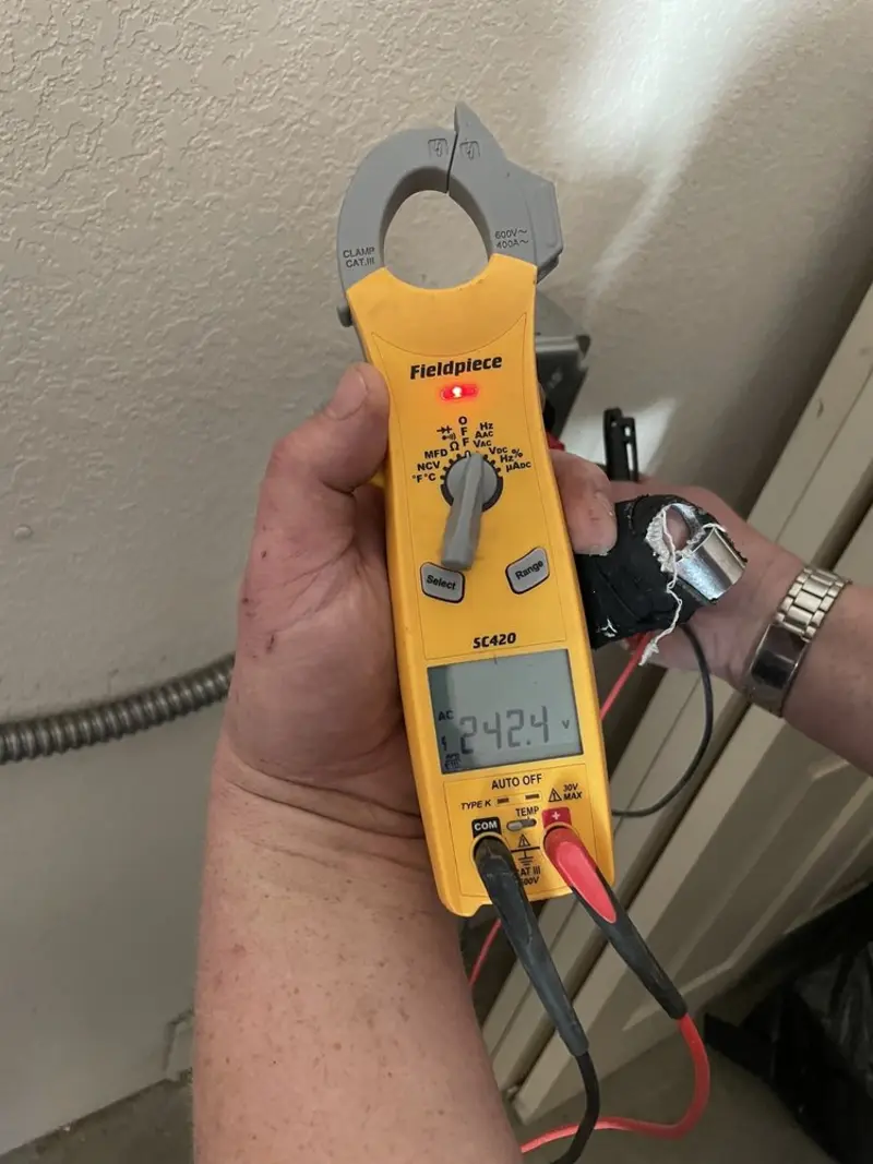 Voltage testing with clamp meter during Outlet Installation in Palo Cedro
